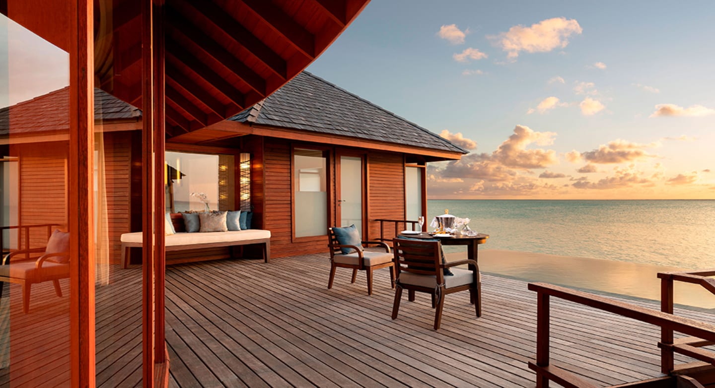 Sunset Over Water Pool Suite